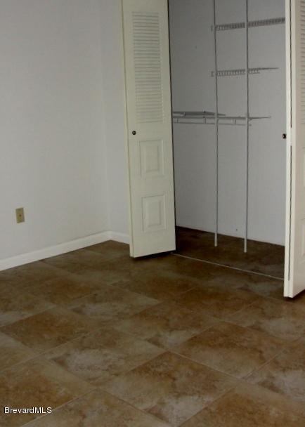 914 Cherokee Road Southeast Palm Bay, FL 32909 - Photo 21 of 36 Master bed closet