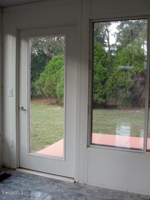 914 Cherokee Road Southeast Palm Bay, FL 32909 - Photo 29 of 36 door from porch