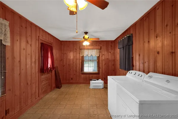 a bathroom with a sink a large mirror and shower