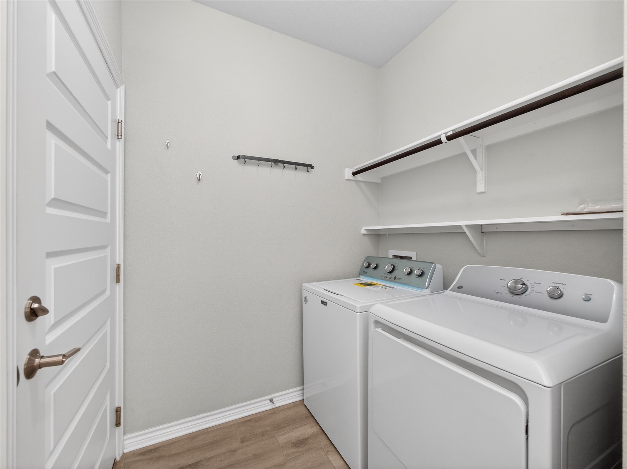 521 Rearing Mare Pass Georgetown, TX 78626 - Photo 25 of 39 a utility room with dryer and washer