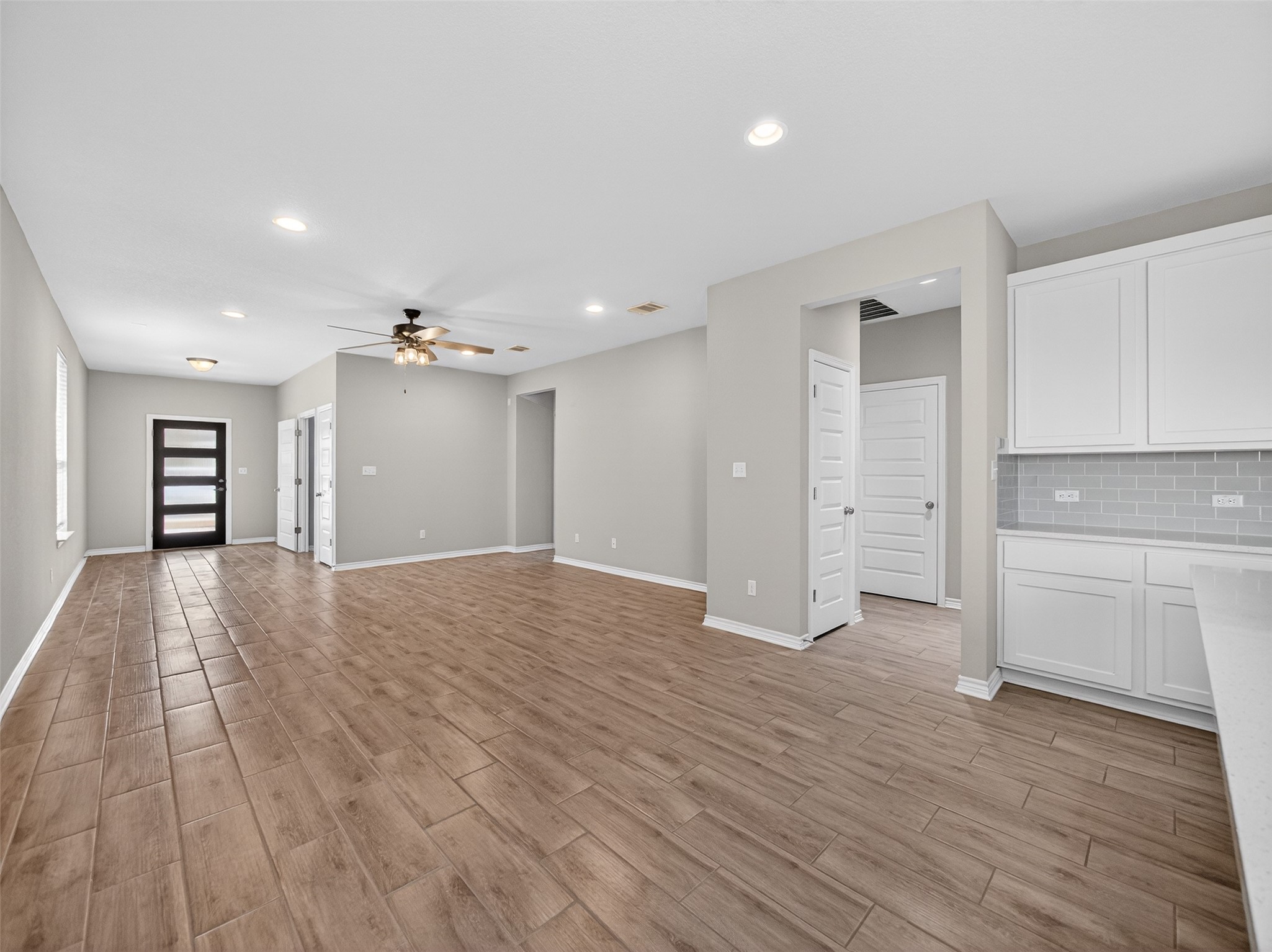 521 Rearing Mare Pass Georgetown, TX 78626 - Photo 7 of 39 a view of empty room with wooden floor