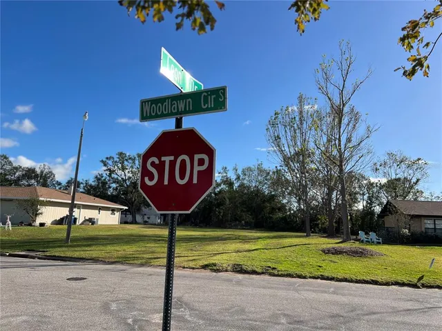 a view of a park with welcome board