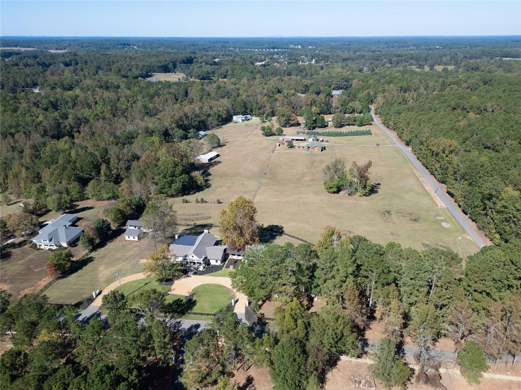 419 Parker Road McDonough, GA 30252 - Photo 100 of 103 an aerial view of a house with mountain view