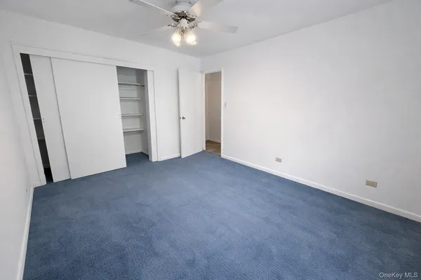 a bathroom with a shower and toilet