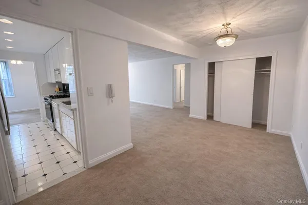 a view of empty room with windows