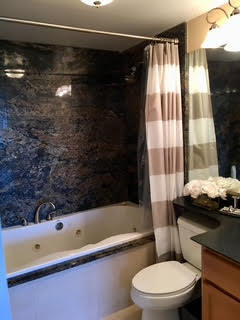 1 Renaissance Place, Unit 1100 Palatine, IL 60067 - Photo 16 of 28 a bathroom with a bathtub and a shower