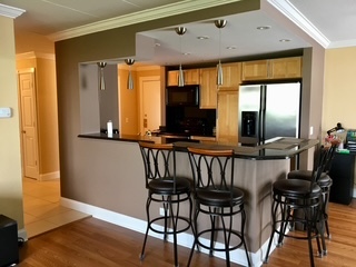 1 Renaissance Place, Unit 1100 Palatine, IL 60067 - Photo 3 of 28 a view of a dining room with furniture and a window