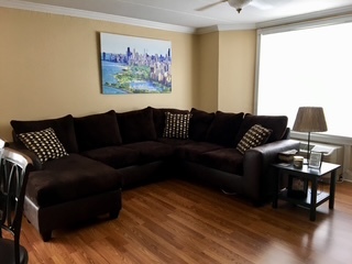 1 Renaissance Place, Unit 1100 Palatine, IL 60067 - Photo 5 of 28 a living room with furniture and a wooden floor