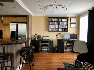 1 Renaissance Place, Unit 1100 Palatine, IL 60067 - Photo 7 of 28 a view of a dining room with furniture window and wooden floor