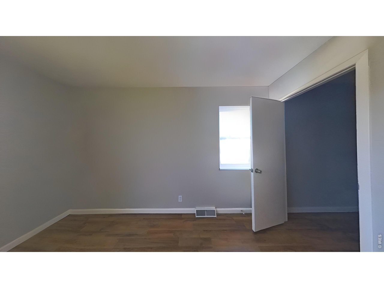 1165 South Oneida Street, Unit E Denver, CO 80224 - Photo 15 of 18 a black and white photo of a living room