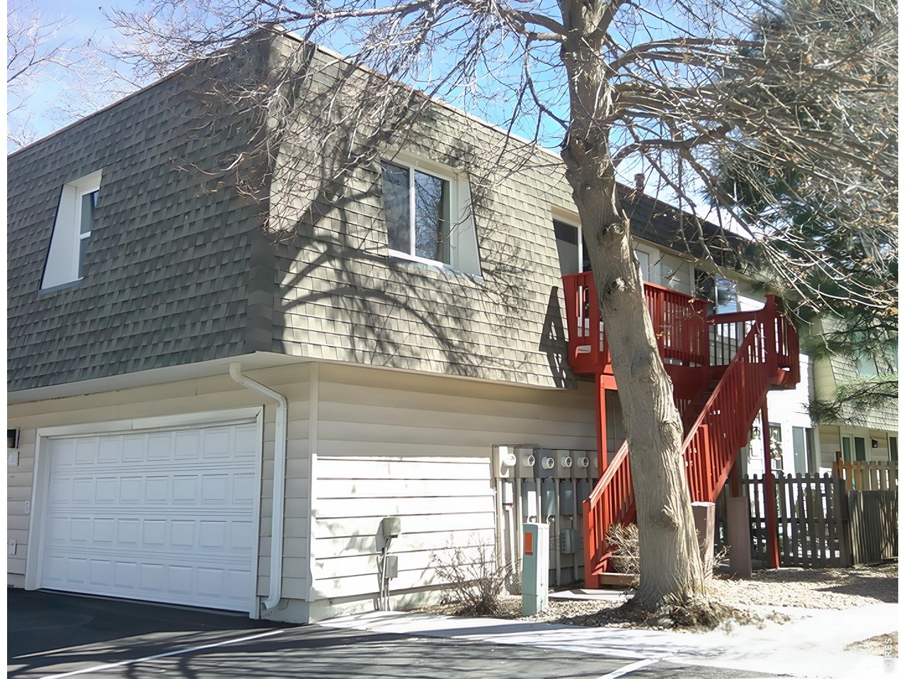 1165 South Oneida Street, Unit E Denver, CO 80224 - Photo 4 of 18 a front view of a house