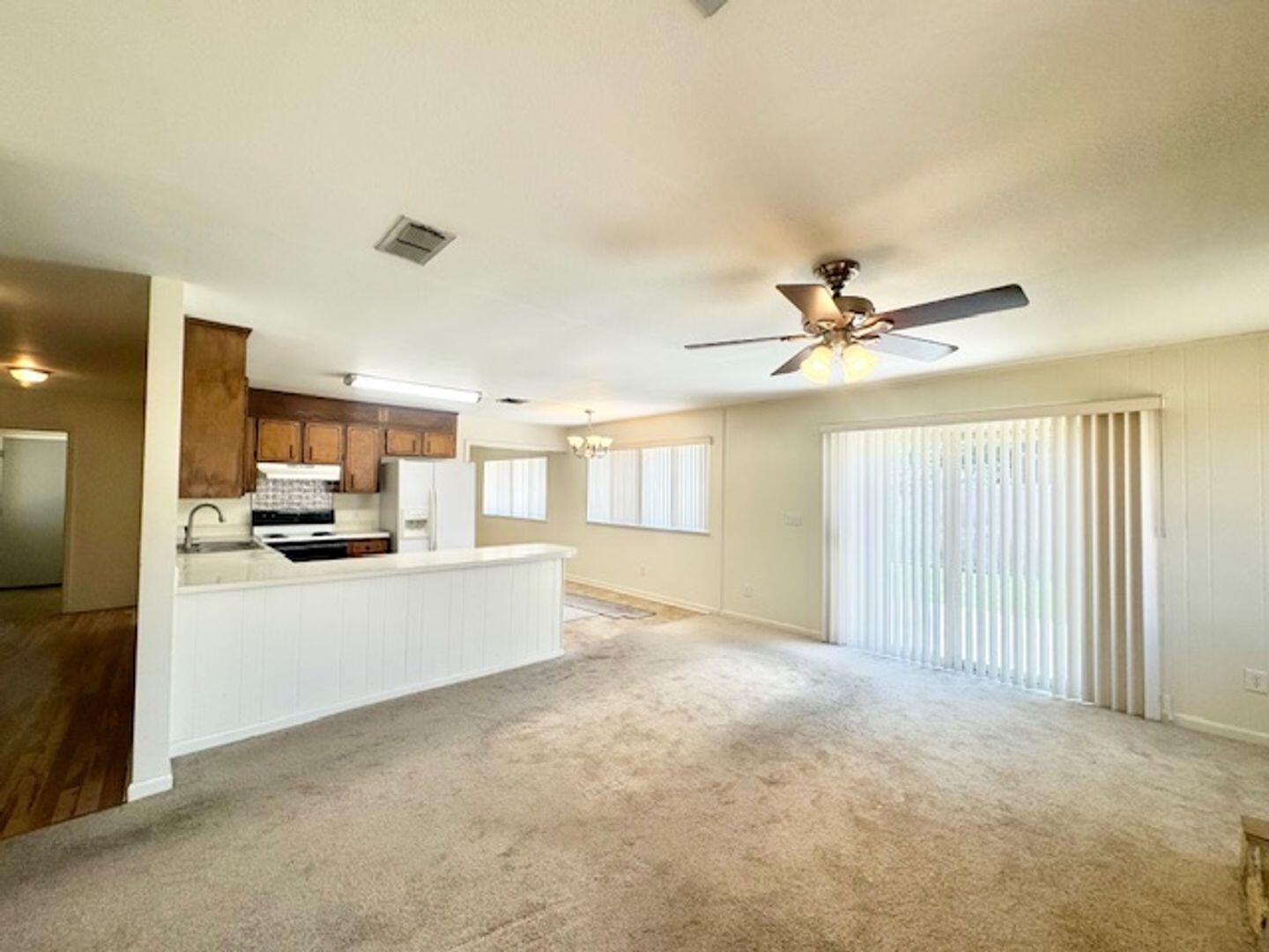 135 Perdido Circle Niceville, FL 32578 - Photo 14 of 22 a view of a kitchen with a sink and a window