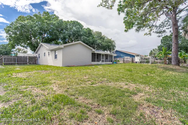 a view of a garage with rack and bicycle