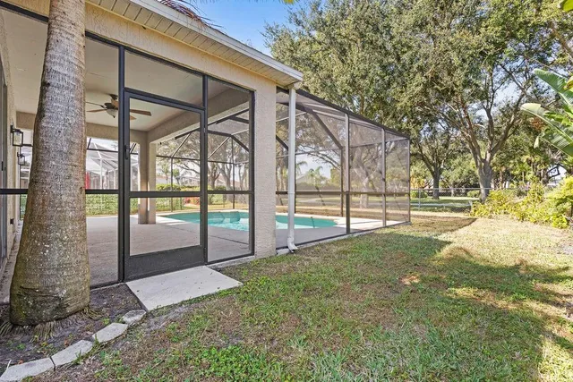 a view of a garden with an outdoor seating