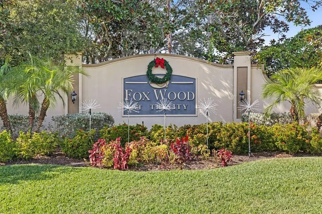 a view of swimming pool with lounge area