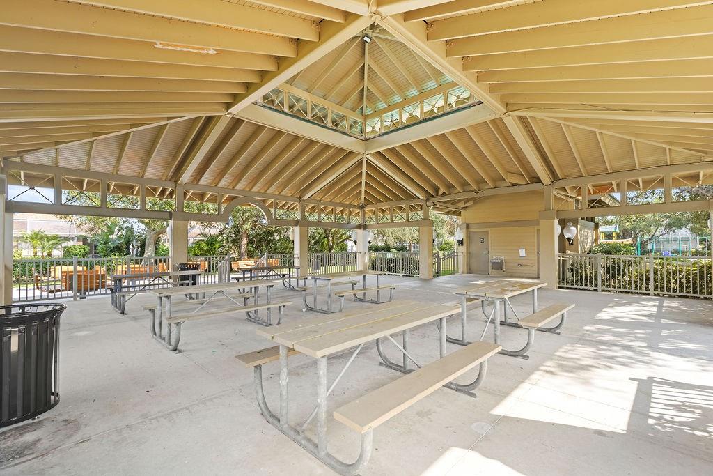 10641 Firebrick Court Trinity, FL 34655 - Photo 39 of 47 a view of a patio with a table and chairs