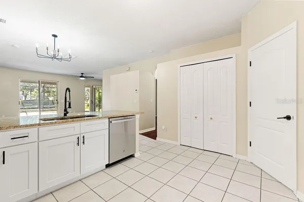 a spacious bathroom with a sink a mirror and a vanity