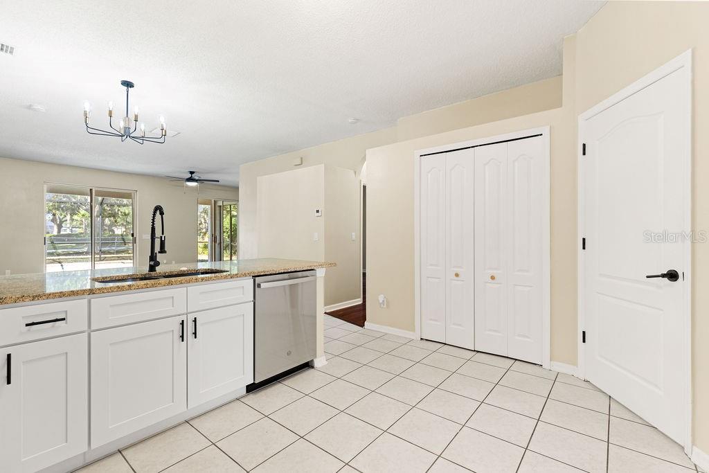 10641 Firebrick Court Trinity, FL 34655 - Photo 5 of 47 a spacious bathroom with a sink a mirror and a vanity