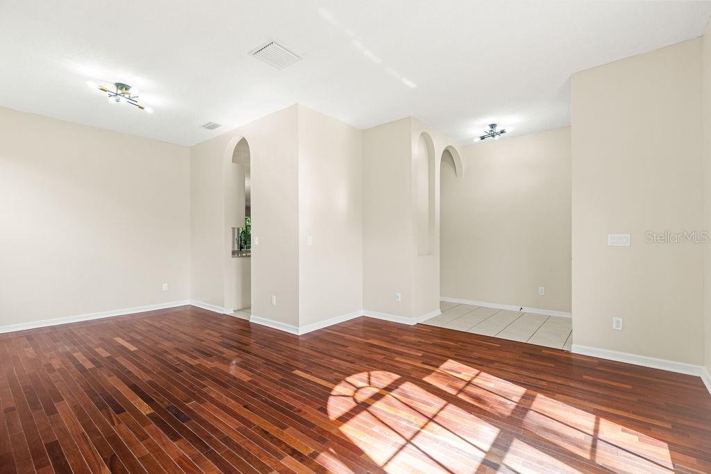10641 Firebrick Court Trinity, FL 34655 - Photo 8 of 47 a view of a room with wooden floor