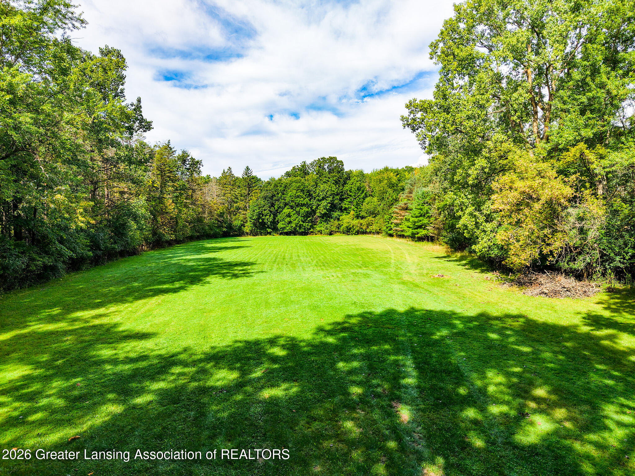 4497 Meridian Road Okemos, MI 48864 - Photo 41 of 58 DJI_20260910111916_0024_D