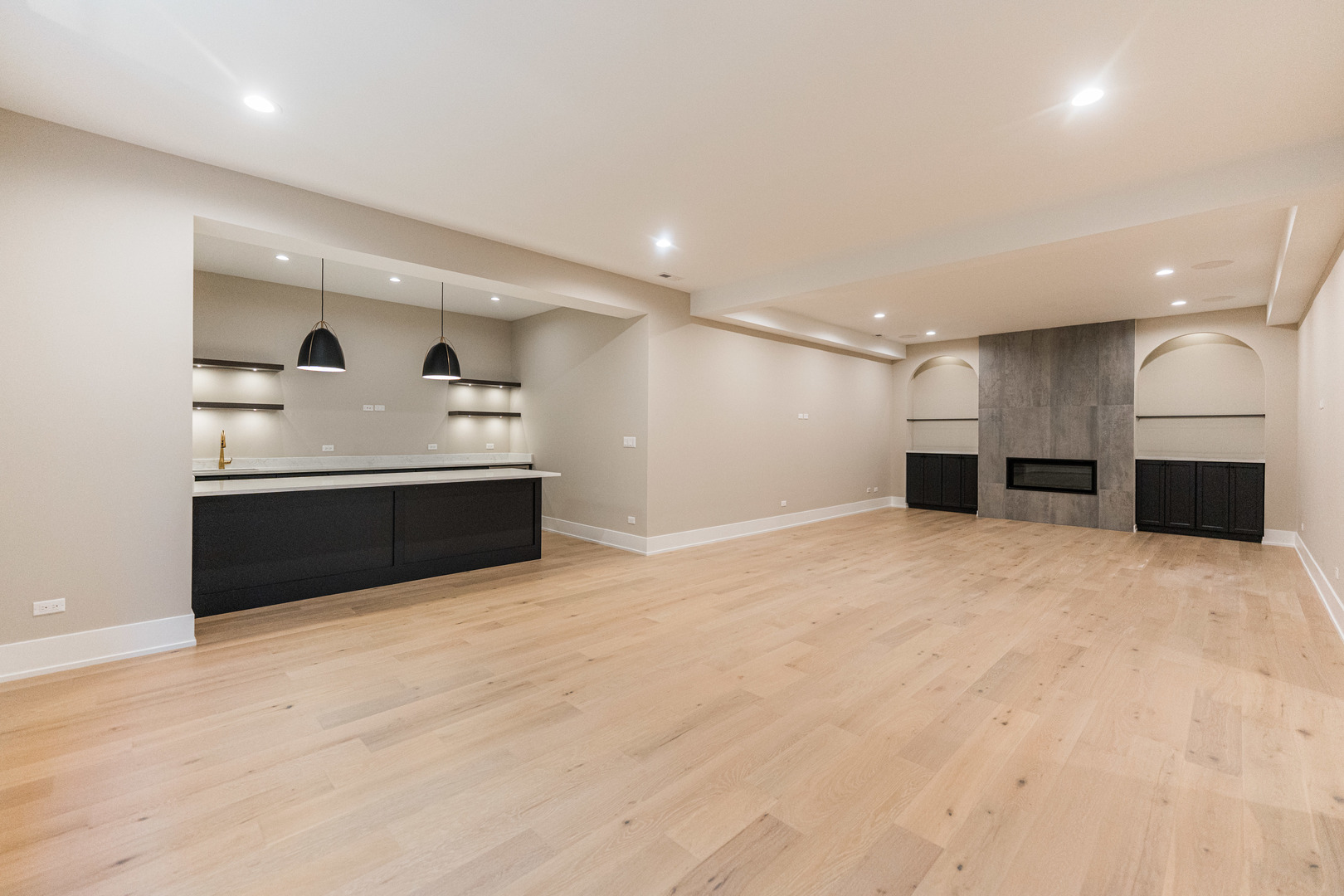 274 East Crescent Avenue Elmhurst, IL 60126 - Photo 18 of 22 a large white room with kitchen island a sink stainless steel appliances and cabinets