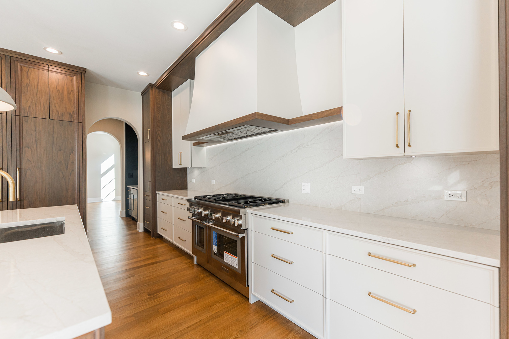 274 East Crescent Avenue Elmhurst, IL 60126 - Photo 6 of 22 a kitchen with granite countertop a stove and a refrigerator