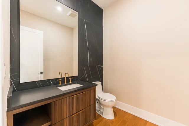 a bathroom with a sink and a toilet