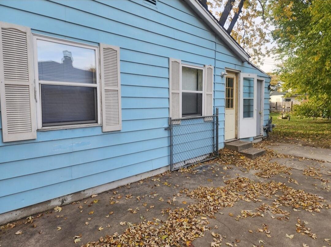 3515 164th Street Hammond, IN 46323 - Photo 11 of 12 a view of house with backyard and trees