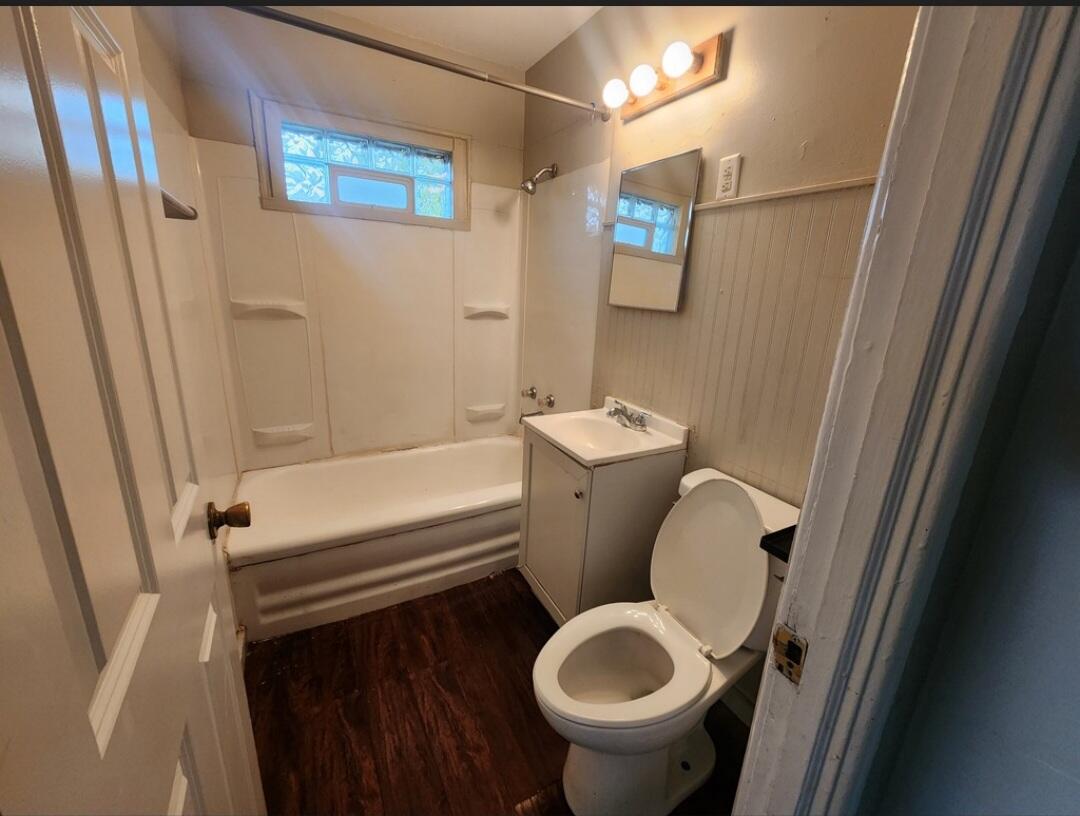 3515 164th Street Hammond, IN 46323 - Photo 9 of 12 a bathroom with a sink and a toilet