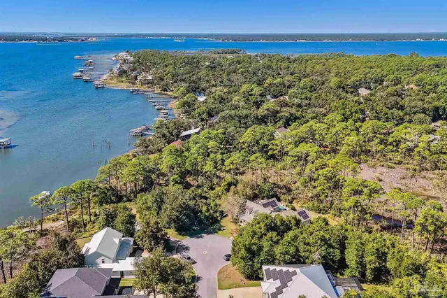 a view of a houses with ocean view