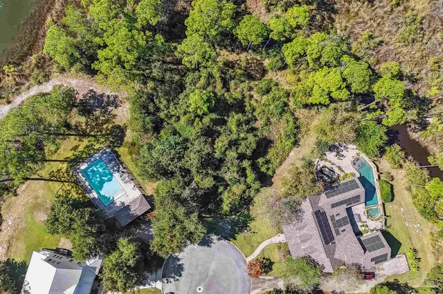 a view of a houses with a lake view