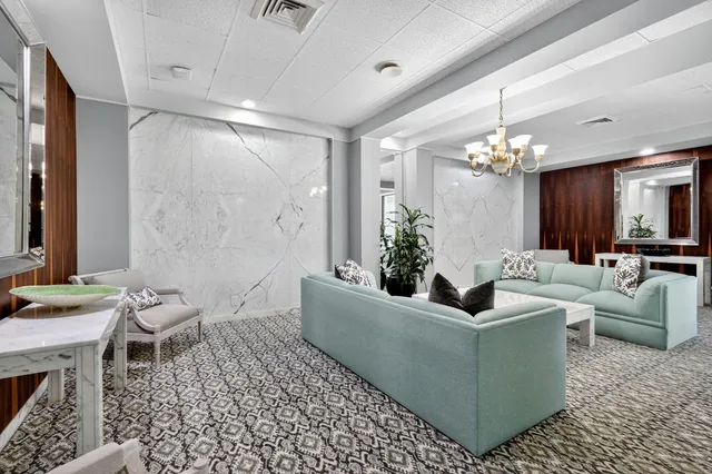 a view of a entryway with livingroom and furniture