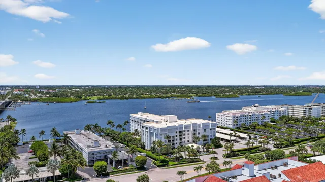 a view of a terrace with chairs and a table