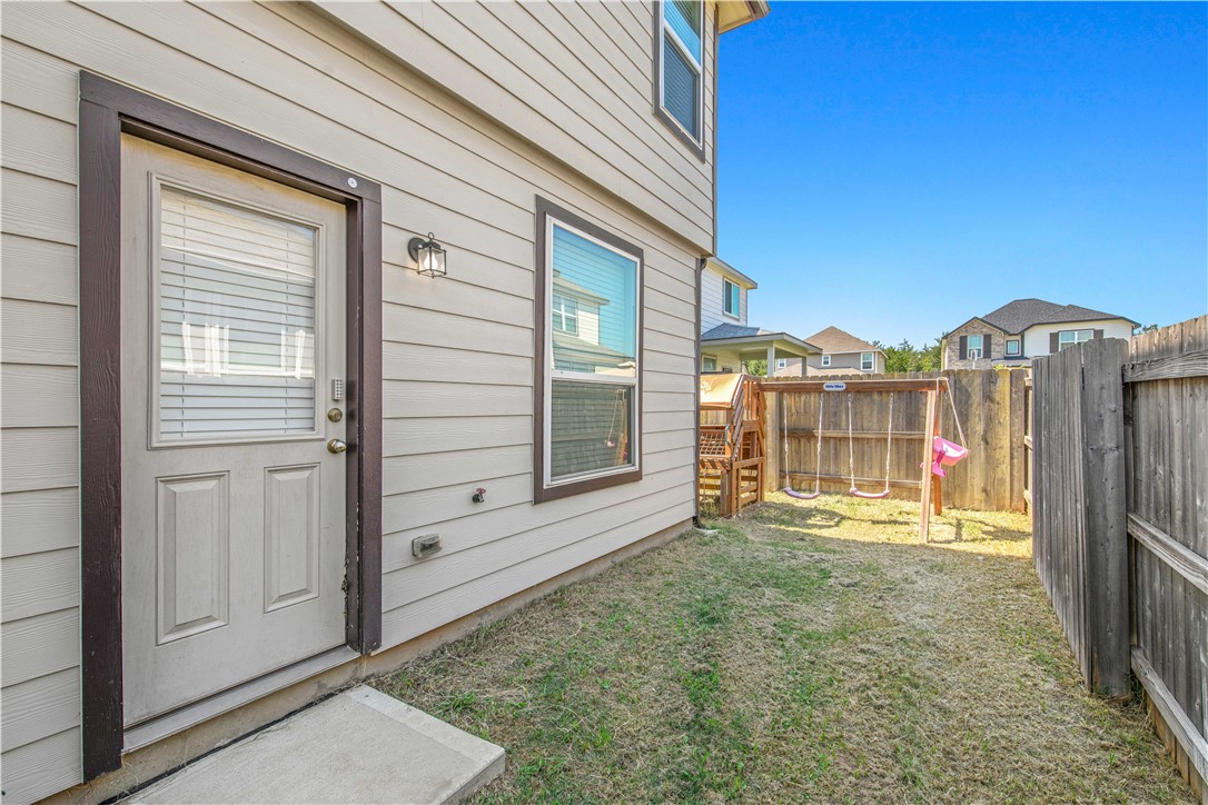 4703 Coyotillo Way Bryan, TX 77807 - Photo 11 of 24 a view of a small house with backyard
