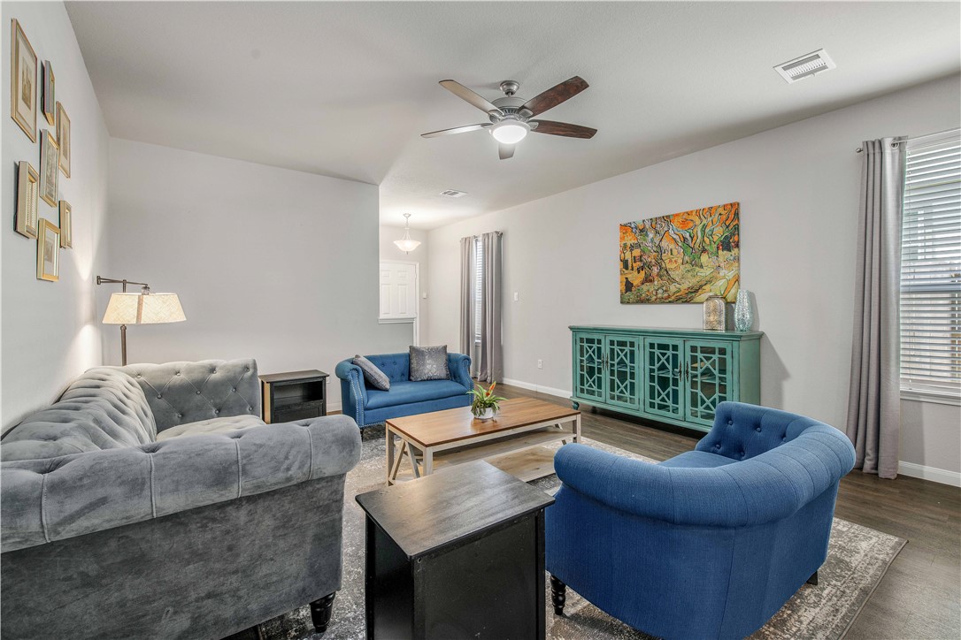4703 Coyotillo Way Bryan, TX 77807 - Photo 6 of 24 a living room with furniture and a window