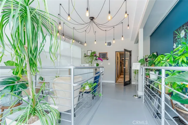 a outdoor space with furniture and a potted plant