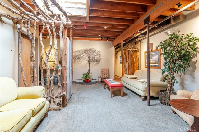 a view of a chairs and bench in the porch
