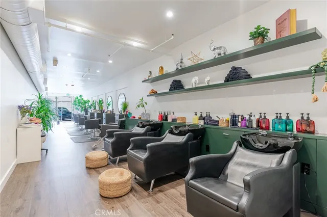 a view of a hallway with wooden shelves