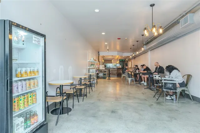 a view of a cars parked in front of a house