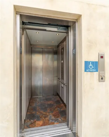 a view of a street with cars