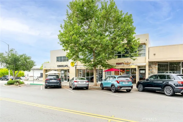 a view of a house with a street
