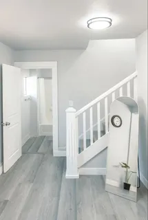 a view of entryway with stairs