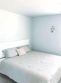a bedroom with a bed