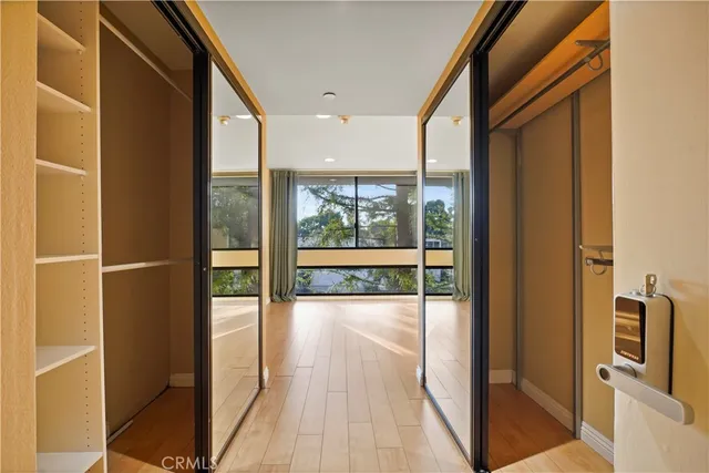 a view of a large room with windows