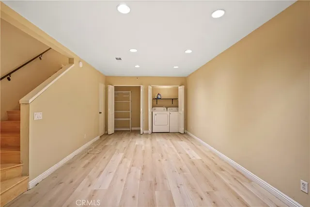 a view of a livingroom with wooden floor