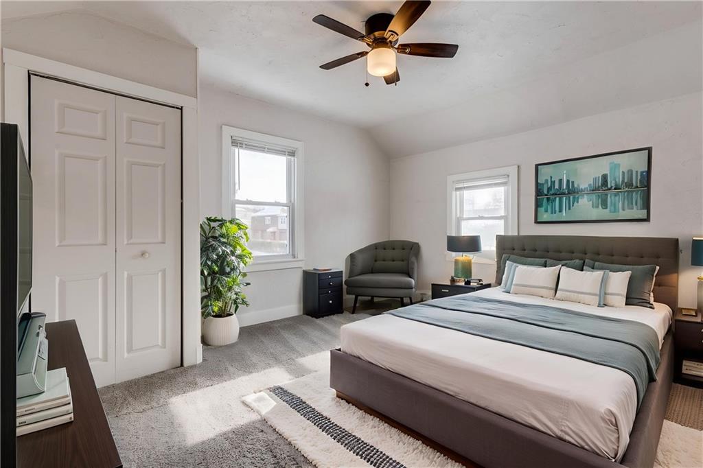 11561 Center Street Irwin, PA 15642 - Photo 22 of 46 a bedroom with a bed potted plant and a window