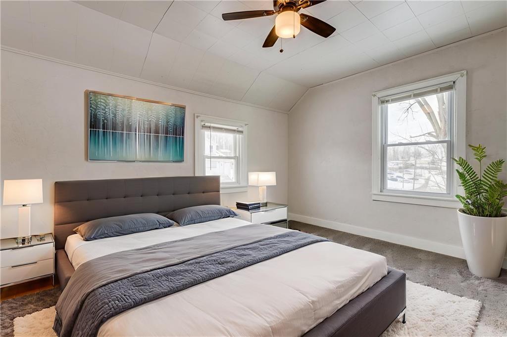 11561 Center Street Irwin, PA 15642 - Photo 27 of 46 a bedroom with a large bed and a window