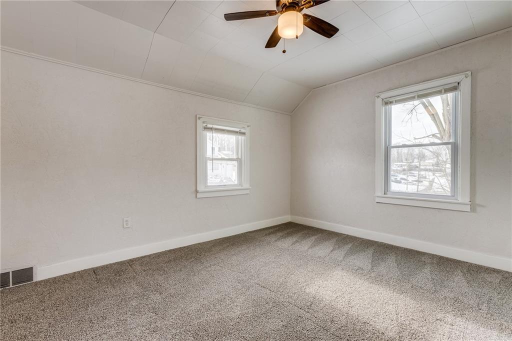 11561 Center Street Irwin, PA 15642 - Photo 28 of 46 a view of a livingroom with a ceiling fan and window
