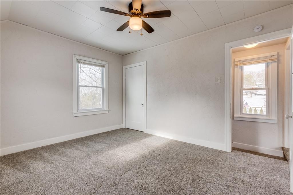 11561 Center Street Irwin, PA 15642 - Photo 29 of 46 a view of empty room with windows
