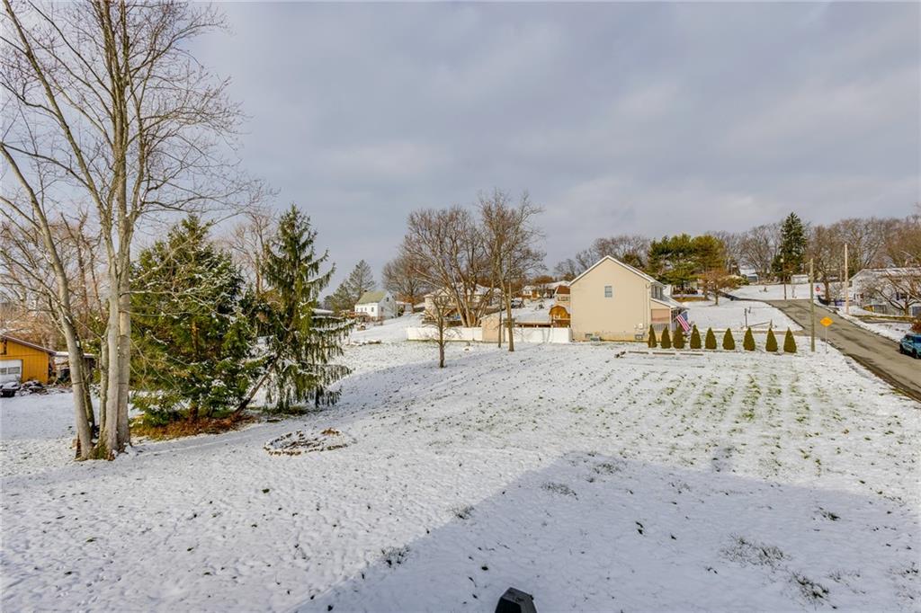 11561 Center Street Irwin, PA 15642 - Photo 46 of 46 a view of a dry yard with trees